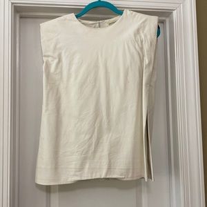 pants store white leather shoulder pad top